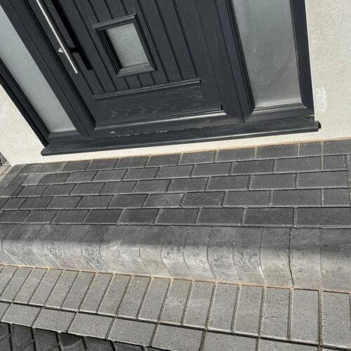 front charcoal block paved driveway side entrance 22