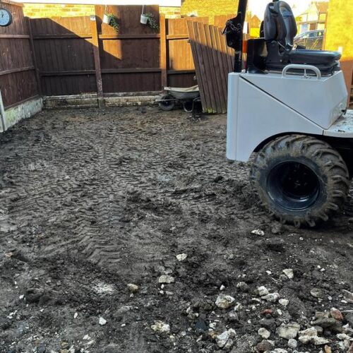 front charcoal block paved driveway side entrance 33